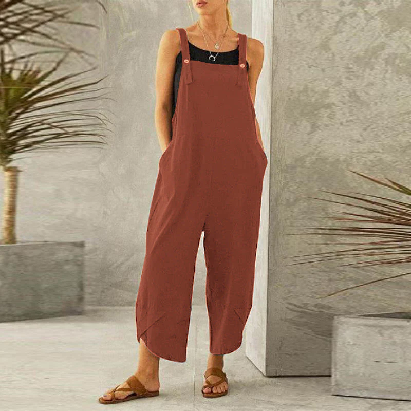 Maureen is een luchtige en comfortabele jumpsuit met een losse pasvorm, wijde pijpen en verstelbare spaghettibandjes. Gemaakt van zacht polyester voor een soepel vallende en ademende look. Perfect voor casual dagen, thuis loungen of zomerse uitjes. Met handige zakken en verkrijgbaar in marineblauw, grijs, rood, groen, zwart, paars en oranje, maten XS-4XL. Voeg moeiteloze stijl toe aan je garderobe met Maureen. Bestel nu en geniet van ultiem comfort!