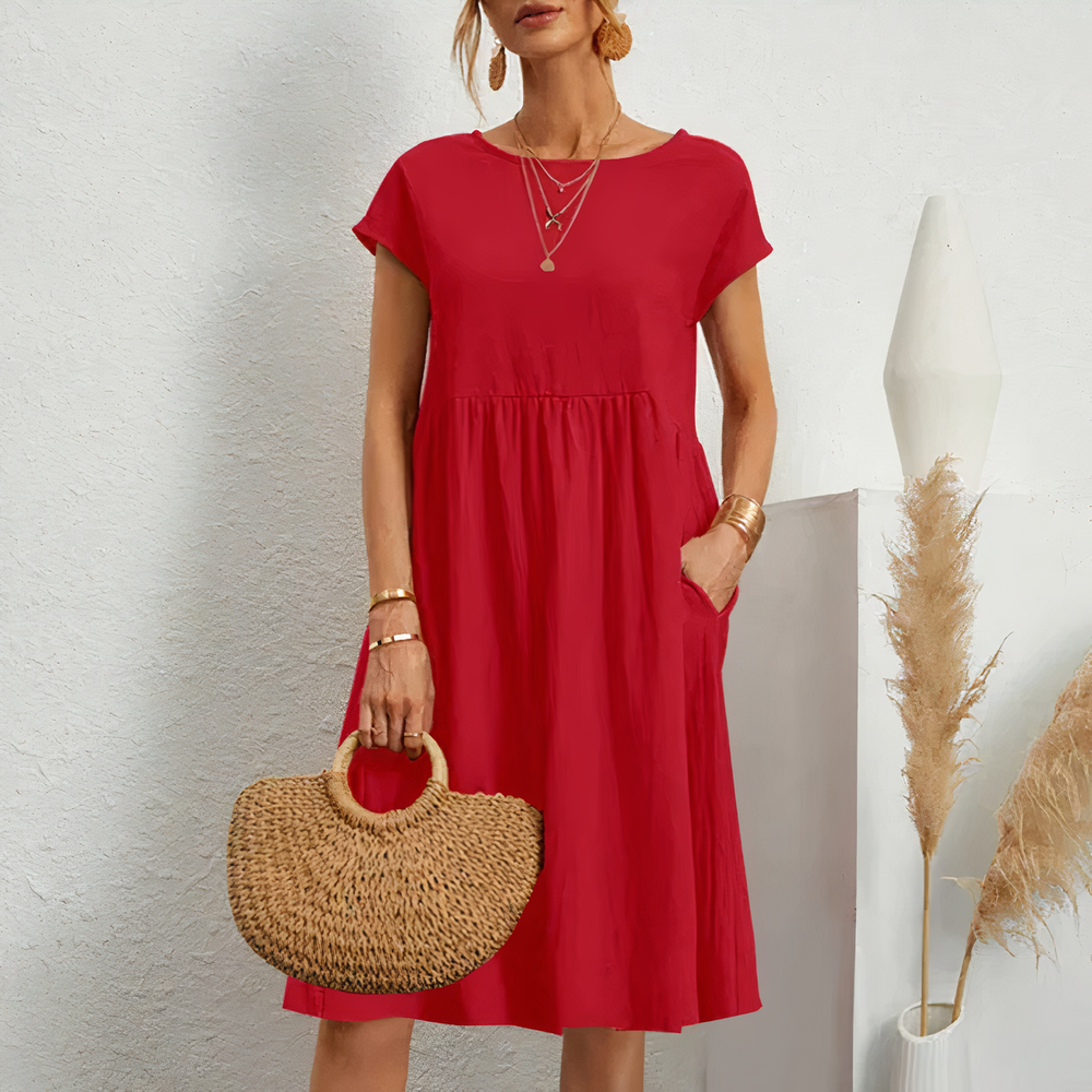 Lina stijlvolle knielange zomerjurk met een licht en ademend ontwerp voor ultiem comfort op warme dagen. Gemaakt van zacht polyester en geschikt voor diverse gelegenheden zoals werk, vakanties en feesten. De perfecte mix van casual en elegantie met een flatterende pasvorm. Verkrijgbaar in wit, khaki, perzik, rode claret, paars, grijs, zwart, donkerblauw, blauw en legergroen, maten XS-2XL. Upgrade je zomergarderobe met Lina en straal moeiteloze stijl uit. Bestel nu!