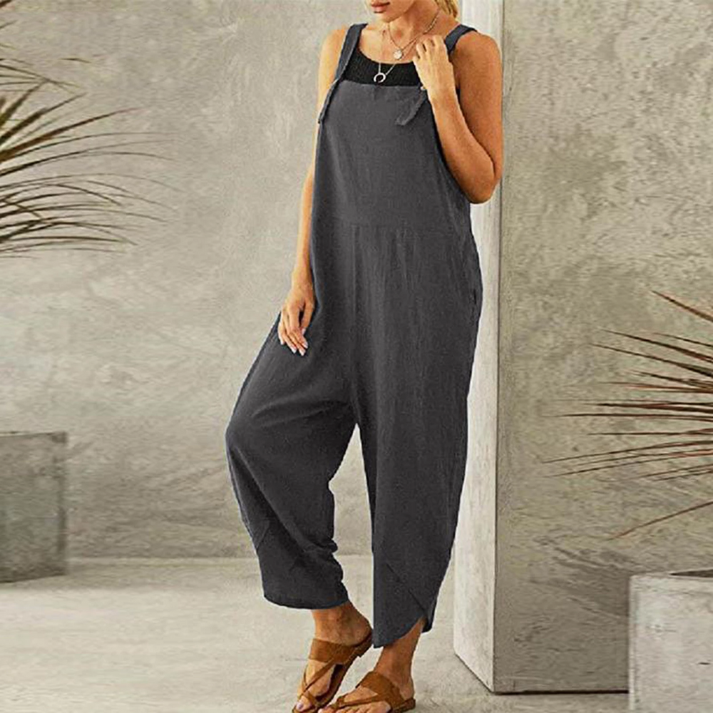 Maureen is een luchtige en comfortabele jumpsuit met een losse pasvorm, wijde pijpen en verstelbare spaghettibandjes. Gemaakt van zacht polyester voor een soepel vallende en ademende look. Perfect voor casual dagen, thuis loungen of zomerse uitjes. Met handige zakken en verkrijgbaar in marineblauw, grijs, rood, groen, zwart, paars en oranje, maten XS-4XL. Voeg moeiteloze stijl toe aan je garderobe met Maureen. Bestel nu en geniet van ultiem comfort!
