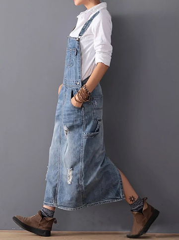 Ervaar moeiteloze stijl met de Eslem jurk, een casual-chique outfit met smalle bandjes en een klassieke denimlook. Gemaakt van een zachte en duurzame mix van katoen en polyester, biedt deze jurk comfort voor dagelijks gebruik. Verkrijgbaar in grijs, in de maten XS tot 2XL. Perfect voor casual uitstapjes, ontspannen weekenden of als laagje over een T-shirt. Upgrade je garderobe met de veelzijdige Eslem jurk voor een moderne en elegante uitstraling.