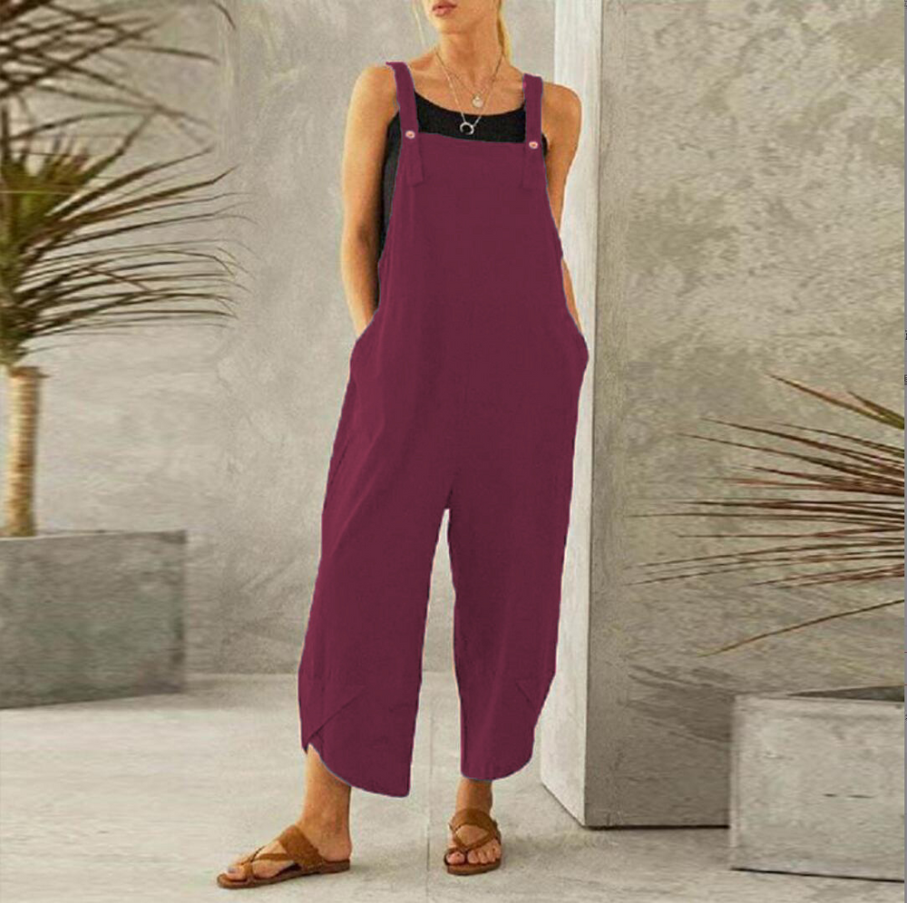 Maureen is een luchtige en comfortabele jumpsuit met een losse pasvorm, wijde pijpen en verstelbare spaghettibandjes. Gemaakt van zacht polyester voor een soepel vallende en ademende look. Perfect voor casual dagen, thuis loungen of zomerse uitjes. Met handige zakken en verkrijgbaar in marineblauw, grijs, rood, groen, zwart, paars en oranje, maten XS-4XL. Voeg moeiteloze stijl toe aan je garderobe met Maureen. Bestel nu en geniet van ultiem comfort!