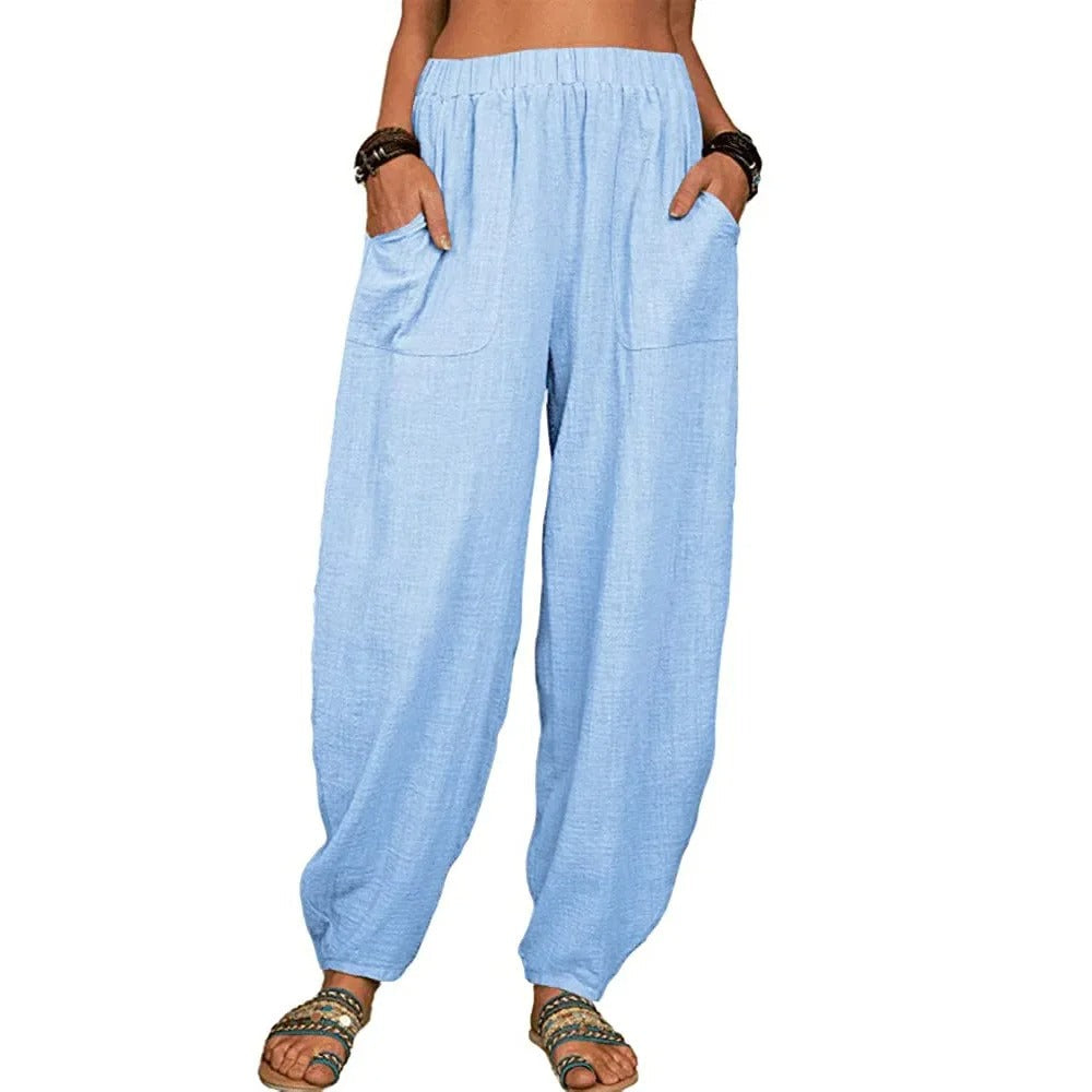 Sue Boho Broek - Voeg zorgeloze zomerstijl toe aan je garderobe met Sue, een hoog getailleerde broek met een losvallend silhouet en functionele zakken. Gemaakt van een ademende mix van katoen en linnen voor ultiem comfort op warme dagen. Perfect voor vakanties, strandwandelingen of casual uitstapjes. Verkrijgbaar in donkerblauw, paars, lichtblauw, zwart, wit, grijs, rood, groen en bruin, in maten XS-4XL. Bestel nu en geniet van moeiteloze boho-elegantie!