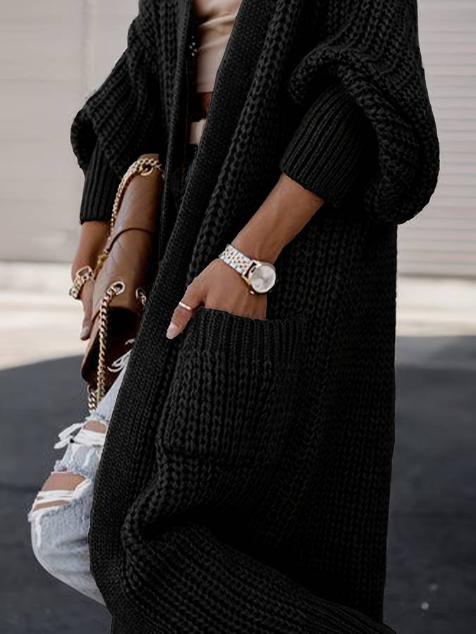 Vivienne | Voeg moeiteloze stijl en warmte toe aan je garderobe met de Vivienne. Deze oversized jas heeft een tijdloos silhouet, grote functionele zakken en is gemaakt van zachte, knusse stof. Verkrijgbaar in marineblauw, donkergrijs, kameel, lichtgrijs en zwart, en maten S-4XL. Perfect voor frisse dagen en stijlvolle casual looks. Combineer comfort en veelzijdigheid met de Vivienne. Bestel nu en geniet van tijdloze elegantie en ultiem draagcomfort!