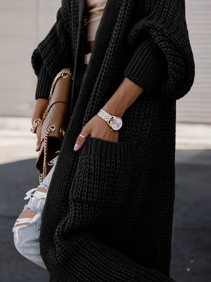 Vivienne | Voeg moeiteloze stijl en warmte toe aan je garderobe met de Vivienne. Deze oversized jas heeft een tijdloos silhouet, grote functionele zakken en is gemaakt van zachte, knusse stof. Verkrijgbaar in marineblauw, donkergrijs, kameel, lichtgrijs en zwart, en maten S-4XL. Perfect voor frisse dagen en stijlvolle casual looks. Combineer comfort en veelzijdigheid met de Vivienne. Bestel nu en geniet van tijdloze elegantie en ultiem draagcomfort!