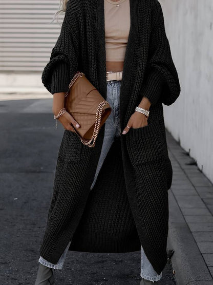 Vivienne | Voeg moeiteloze stijl en warmte toe aan je garderobe met de Vivienne. Deze oversized jas heeft een tijdloos silhouet, grote functionele zakken en is gemaakt van zachte, knusse stof. Verkrijgbaar in marineblauw, donkergrijs, kameel, lichtgrijs en zwart, en maten S-4XL. Perfect voor frisse dagen en stijlvolle casual looks. Combineer comfort en veelzijdigheid met de Vivienne. Bestel nu en geniet van tijdloze elegantie en ultiem draagcomfort!