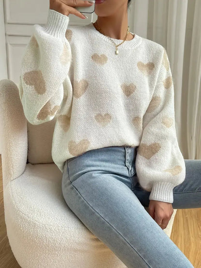 Zariah trui: charmante witte trui met zacht hartpatroon voor een speelse en knusse uitstraling. Perfect voor casual uitjes, knusse weekenden of ontspannen dagen thuis. Ontspannen pasvorm en zachte stof bieden comfort en warmte bij koelere temperaturen. Combineer moeiteloos met jeans, leggings of rokken voor veelzijdige looks. Verkrijgbaar in maten XS-L. Voeg een vleugje vrolijke charme toe aan je garderobe met de Zariah. Bestel nu en ervaar comfort en stijl in één!
