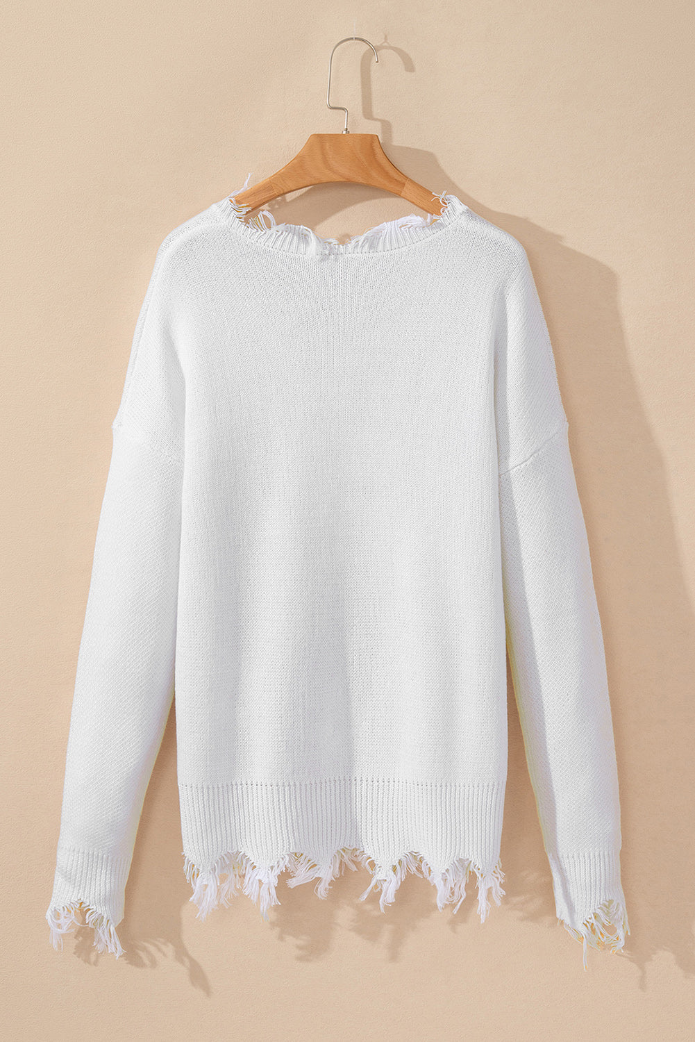 Monroe | Witte trui met rafelige details en pailletten