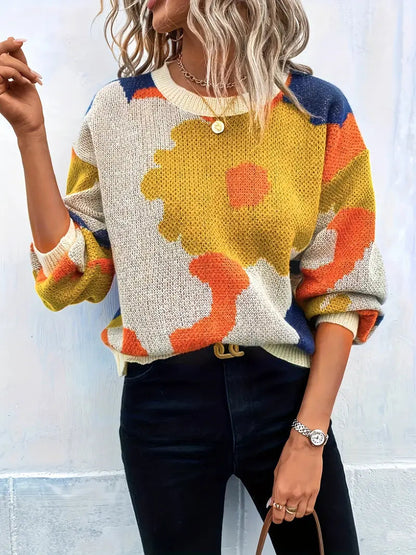 Arabella trui met abstract bloemenontwerp – een levendig en artistiek statementstuk voor je garderobe. Met een comfortabele pasvorm en lichte warmte biedt deze trui een perfecte mix van stijl en comfort. Ideaal voor casual dagen, creatieve bijeenkomsten of gezellige avonden. Combineer eenvoudig met jeans of leggings voor een opvallende look. Verkrijgbaar in veelkleurig, maten S-XL. Voeg expressieve flair en comfort toe aan je outfits met de Arabella. Bestel nu!