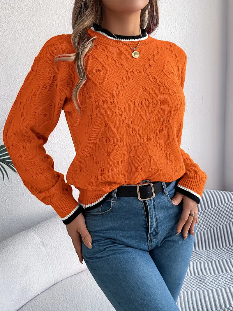 Azaria gebreide trui: elegante trui met uniek textuurpatroon en contrasterende biezen voor een verfijnde, moderne look. Perfect voor werkdagen, casual uitjes of ontspannen weekenden. Comfortabele pasvorm biedt warmte en stijl op koelere dagen. Verkrijgbaar in roze rood, oranje en khaki, maten S-XL. Combineer moeiteloos met jeans, rokken of broeken. Voeg tijdloze elegantie en knus comfort toe aan je garderobe met de Azaria. Bestel nu en upgrade je stijl!