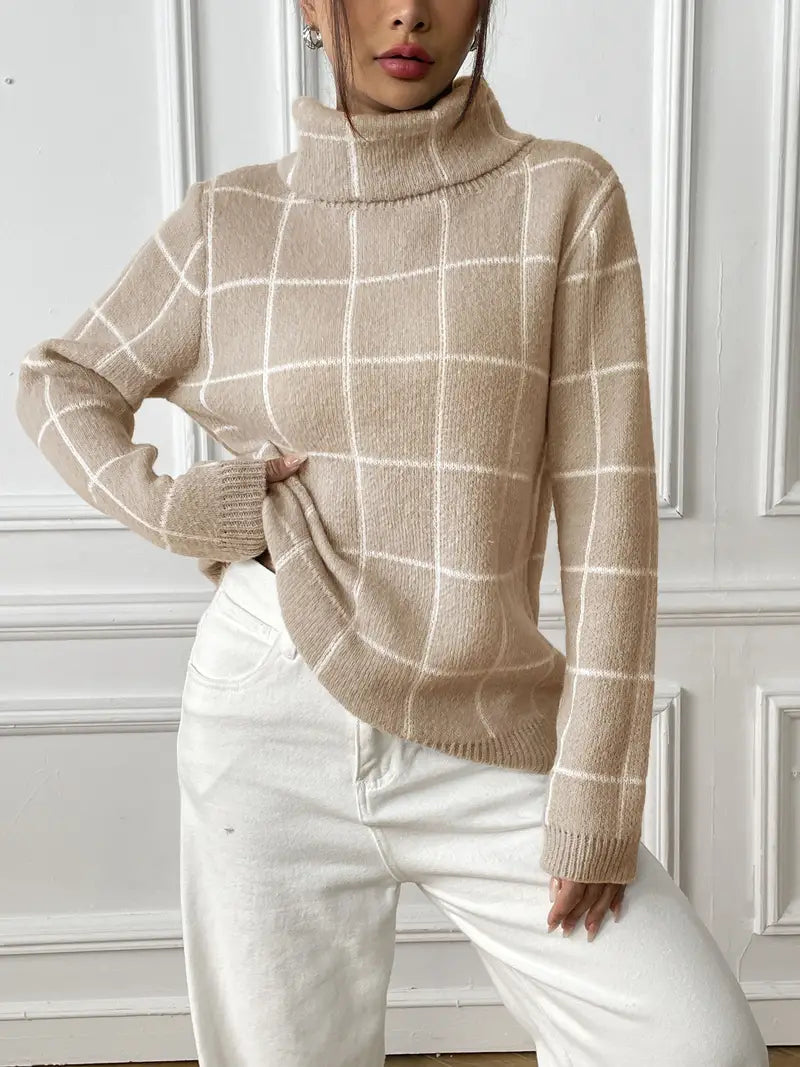 Stijlvolle Elody trui met klassiek ruitpatroon en chique colkraag. Verkrijgbaar in zachte tinten grijs, abrikoos en paars. Perfect voor casual dagen, kantooruren of knusse avonden thuis. Ontspannen pasvorm voor ultiem comfort en tijdloze elegantie. Ideaal voor de koudere maanden, eenvoudig te combineren met jeans of rokken. Voeg deze veelzijdige must-have toe aan je garderobe en geniet van stijlvolle warmte en moderne charme. Bestel nu voor cozy en modieuze looks!