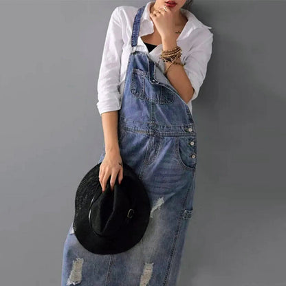 Ervaar moeiteloze stijl met de Eslem jurk, een casual-chique outfit met smalle bandjes en een klassieke denimlook. Gemaakt van een zachte en duurzame mix van katoen en polyester, biedt deze jurk comfort voor dagelijks gebruik. Verkrijgbaar in grijs, in de maten XS tot 2XL. Perfect voor casual uitstapjes, ontspannen weekenden of als laagje over een T-shirt. Upgrade je garderobe met de veelzijdige Eslem jurk voor een moderne en elegante uitstraling.