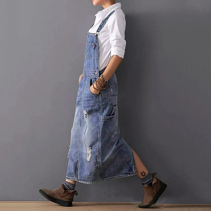 Ervaar moeiteloze stijl met de Eslem jurk, een casual-chique outfit met smalle bandjes en een klassieke denimlook. Gemaakt van een zachte en duurzame mix van katoen en polyester, biedt deze jurk comfort voor dagelijks gebruik. Verkrijgbaar in grijs, in de maten XS tot 2XL. Perfect voor casual uitstapjes, ontspannen weekenden of als laagje over een T-shirt. Upgrade je garderobe met de veelzijdige Eslem jurk voor een moderne en elegante uitstraling.