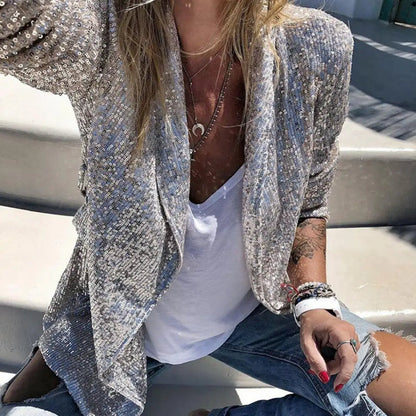 Asenet elegante sequin cardigan met lange mouwen en glanzend open ontwerp voor een luxe uitstraling. Perfect voor feestjes, speciale gelegenheden of om een vleugje glamour aan je dagelijkse look toe te voegen. Gemaakt van zacht polyester voor comfort en bewegingsvrijheid. Verkrijgbaar in zwart, grijs, zilver en champagne, maten S-2XL. Laat je outfit stralen met Asenet en ervaar stijl en elegantie in één. Bestel nu en maak een sprankelende indruk.