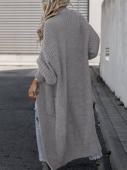 Vivienne | Voeg moeiteloze stijl en warmte toe aan je garderobe met de Vivienne. Deze oversized jas heeft een tijdloos silhouet, grote functionele zakken en is gemaakt van zachte, knusse stof. Verkrijgbaar in marineblauw, donkergrijs, kameel, lichtgrijs en zwart, en maten S-4XL. Perfect voor frisse dagen en stijlvolle casual looks. Combineer comfort en veelzijdigheid met de Vivienne. Bestel nu en geniet van tijdloze elegantie en ultiem draagcomfort!