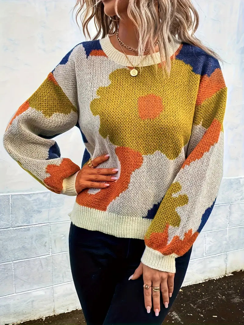 Arabella trui met abstract bloemenontwerp – een levendig en artistiek statementstuk voor je garderobe. Met een comfortabele pasvorm en lichte warmte biedt deze trui een perfecte mix van stijl en comfort. Ideaal voor casual dagen, creatieve bijeenkomsten of gezellige avonden. Combineer eenvoudig met jeans of leggings voor een opvallende look. Verkrijgbaar in veelkleurig, maten S-XL. Voeg expressieve flair en comfort toe aan je outfits met de Arabella. Bestel nu!