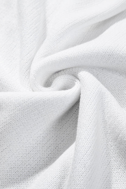 Monroe | Witte trui met rafelige details en pailletten