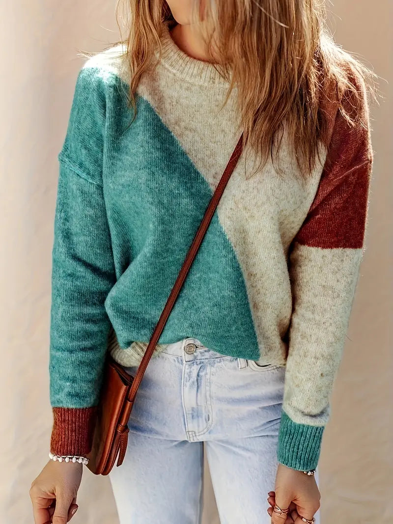 Soleil colorblock sweater – een opvallende en stijlvolle toevoeging aan je garderobe. Met een uniek ontwerp in aardetinten en een zachte, cozy pasvorm biedt deze trui comfort en warmte. Perfect voor casual uitjes, koffieafspraken of weekendavonturen. Combineer eenvoudig met jeans, leggings of rokken voor een trendy look. Verkrijgbaar in veelkleurig, maten XS-2XL. Voeg een vleugje moderne stijl en gezelligheid toe aan je outfit met de Soleil. Bestel nu!