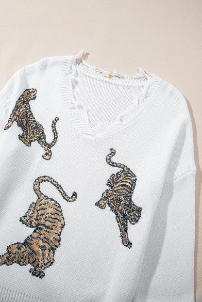 Monroe | Witte trui met rafelige details en pailletten