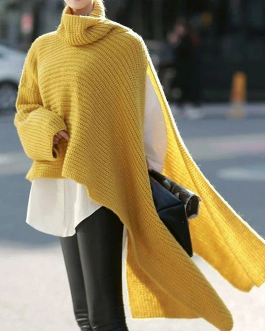 Ervaar verfijning met de Malina, een asymmetrische top die comfort en stijl biedt voor koude dagen. Ideaal voor casual uitjes, frisse avonden of als laagje over je favoriete outfits. Verkrijgbaar in Geel en Baksteen Rood, maten S-4XL. Combineer warmte en veelzijdigheid in één elegant kledingstuk. Bestel de Malina vandaag en voeg een unieke flair toe aan je garderobe!