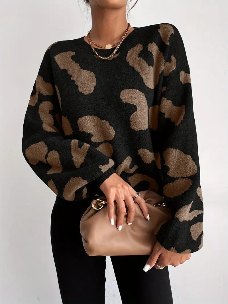 Trendy luipaardpatroon, comfortabele pasvorm en veelzijdige stijl: de Oralie trui biedt gedurfde elegantie en ultiem comfort. Perfect voor casual uitjes of avondbijeenkomsten, met chique zwart/kameel tinten die elke outfit versterken. Bestel nu en voeg een stijlvolle edge toe aan je garderobe!