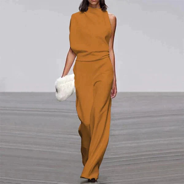 Paulien jumpsuit – gedurfde elegantie en ultiem comfort. Met een off-the-shoulder ontwerp en wijde pijpen creëert deze jumpsuit een flatterend silhouet. Gemaakt van rekbaar polyester en spandex voor een soepele pasvorm. Perfect voor feesten, avondjes uit en speciale gelegenheden. Verkrijgbaar in oranje, wit, groen, zwart, rozerood, rood en geeloranje, in maten XS-3XL. Een stijlvol statement voor elk seizoen. Bestel nu en straal in deze trendy must-have!