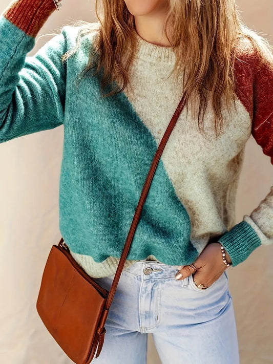 Soleil colorblock sweater – een opvallende en stijlvolle toevoeging aan je garderobe. Met een uniek ontwerp in aardetinten en een zachte, cozy pasvorm biedt deze trui comfort en warmte. Perfect voor casual uitjes, koffieafspraken of weekendavonturen. Combineer eenvoudig met jeans, leggings of rokken voor een trendy look. Verkrijgbaar in veelkleurig, maten XS-2XL. Voeg een vleugje moderne stijl en gezelligheid toe aan je outfit met de Soleil. Bestel nu!