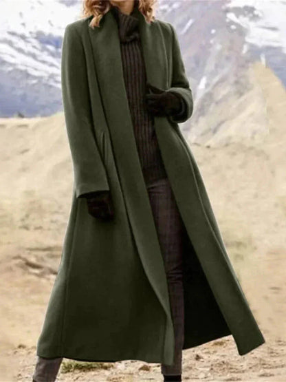 Amira Lange Jas - Elegante en functionele jas voor koelere seizoenen. Combineert een klassiek lang ontwerp met praktische zakken en veelzijdige kleuropties. Gemaakt van hoogwaardig polyester voor ultiem comfort. Verkrijgbaar in zwart en legergroen, maten S-3XL. Perfect voor dagelijks gebruik, kantoor of avondgelegenheden. Upgrade je buitenkleding met de stijlvolle Amira Lange Jas. Bestel nu en ervaar tijdloze elegantie!